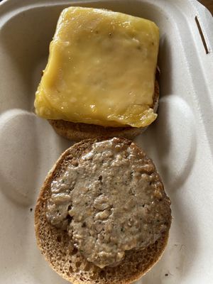 Breakfast Sammy split to see the impossible patty and cheese on the egg at ROOTED in Pleasant Hill