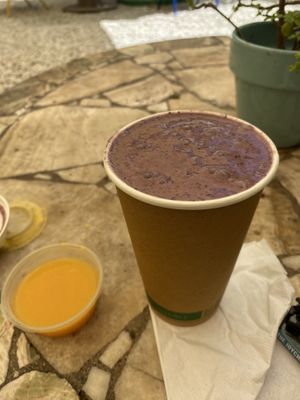 ginger shot and a bleu smoothie   at Aguacate in Miami
