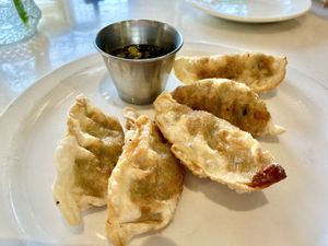 Edamame Dumplings. Our server recommended these as a modified vegan option knowing I had a dairy allergy. Just be clear when ordering, by default they may be prepared with butter.  at The Vault in Savannah