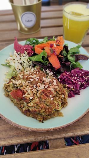 Vegan zucchini gratin with a plethora of salads 😍 at Cabane  in Lisbon