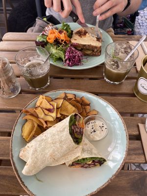 Croquet with goat cheese and zucchini (top) and wrap with avocado and chips (bottom)  at Cabane  in Lisbon