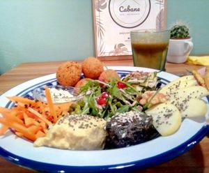 Salad with hummus, olive paste and veggiesballs at Cabane  in Lisbon