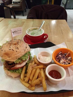 Mushroom burger with matcha tea at The Mossy Forest Cafe in Tanah Rata
