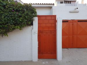 Unimposing gate to a great experience. at Djinkoume House in Dakar