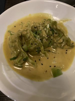 Vegan dumplings in coconut curry saucee  at Koto in Cork