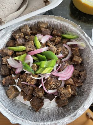 Seitan tibs. $7 add on. Seasoned well but would prefer to have a sauce. Would’ve been happier with a smaller add on for a smaller price. This is just a lot of seitan    at Vegan Community Kitchen in Apex