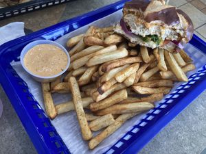 Buffalo Chick’n Sandwich with fries and spicy sauce  at Honest Pastures in Virginia Beach