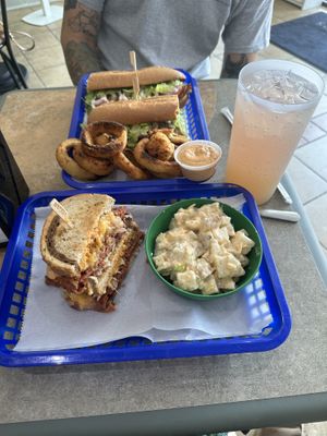 Large Grinder, Onion Rings (air fried), Reuben, Loaded Baked Potato Salad, Lavender Lemonade   at Honest Pastures in Virginia Beach