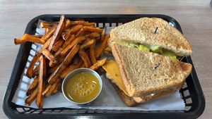 Club Sandwich, sweet potato fries, and honey mustard.   at Honest Pastures in Virginia Beach