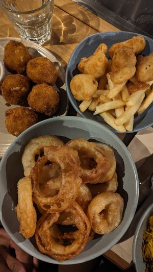Mac n Cheese Bites $16.00, Onion Rings $12.00, Cauliflower Nuggets $12.00 - all delicious at The Carringbush Hotel in Abbotsford