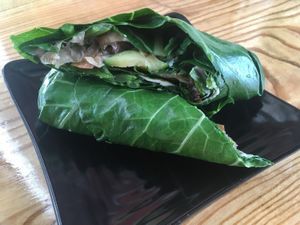 Mushroom Galaxy Burger with collard green wrap. at Copper Branch in Fort Lauderdale