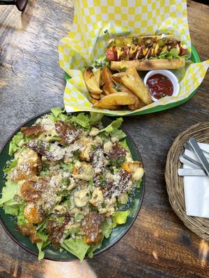 Caesar salad & hot dog  at Coco Calala in Leon