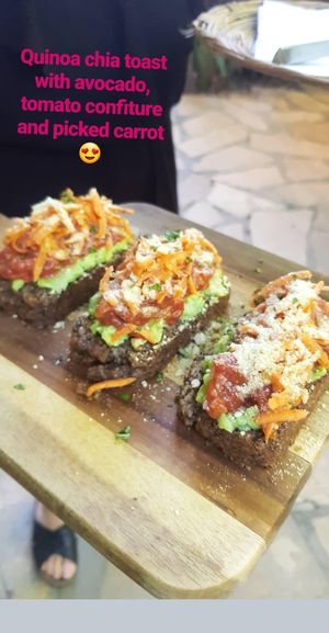 Quinoa bread, avocado, tomato, carrot. Amazing! at Coco Calala in Leon