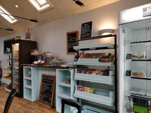 Interior of the Press Room Cafe featuring the cold options, note vegan cake in refrigerator :) at The Press Room Cafe in Conwy