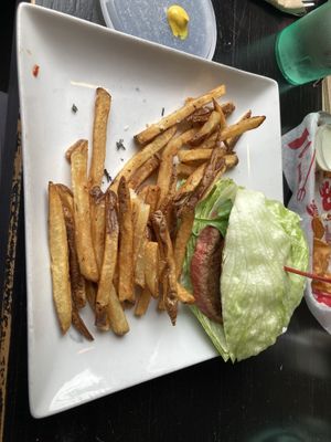 Lettuce-wrapped impossible burger with fries  at Burgatory in Homestead