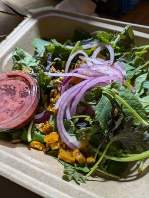 Baby Kale salad with cherry tarragon dressing at Hand Fire Pizza in Jackson