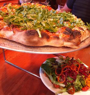 Vegan choice, mixed greens and the vegan pizza at Hand Fire Pizza in Jackson