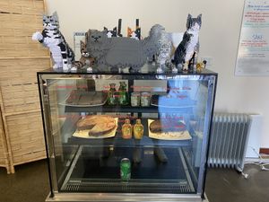 Lots of vegan options in the cabinet !  at Hobart Cat Cafe in North Hobart