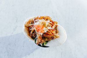 Taiwanese soft steam bun with tempura fried vegetables and teriyaki sauce. Per piece. (salad dressing contains nuts, can opt out) at Sushi Soldier Eightgrains  in Christchurch