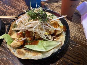 Fried tofu ‘slider’ (spring onion pancake)  at Sushi Soldier Eightgrains  in Christchurch