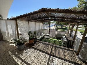 Love reed pergola light   at Balance Cafe in Portimao