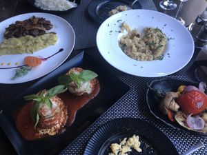 Seitan and mashed potatoes, risotto, zucchini cheese starter and grilled veggie side at Integra in Constanta