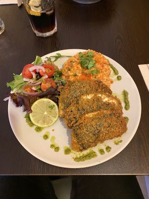 Fish, rice and tomato salad at Kong - Food Made With Compassion in Lisbon