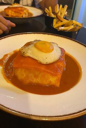 Frasesinha with extra fried egg on top at Kong - Food Made With Compassion in Lisbon
