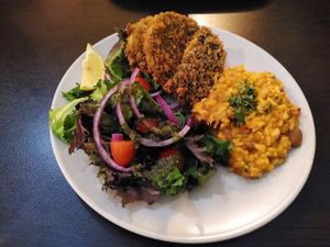 Fried celery-fish with tomato sauce with beans at Kong - Food Made With Compassion in Lisbon