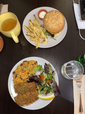 Burger and fish with tomato rice  at Kong - Food Made With Compassion in Lisbon