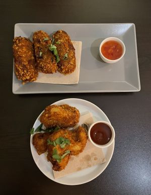 Cauliflower wings and Portuguese sausage.  at Kong - Food Made With Compassion in Lisbon