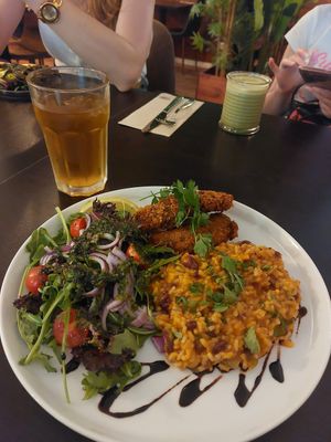 Vegan fish, rice with beans & salad with some iced tea at Kong - Food Made With Compassion in Lisbon