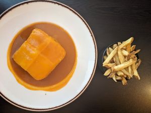 Francesinha (layers of faux meat, bread, cheese) at Kong - Food Made With Compassion in Lisbon