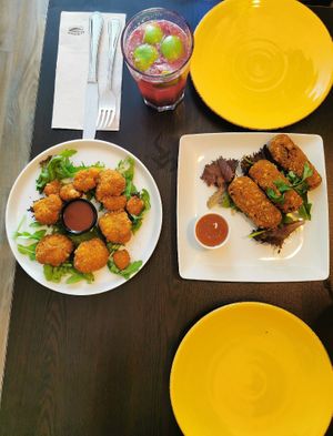 cauliflower wings & alheira/cheese croquettes at Kong - Food Made With Compassion in Lisbon