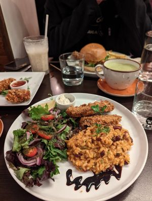 Fish was really good. Croquettes and burger in background. at Kong - Food Made With Compassion in Lisbon