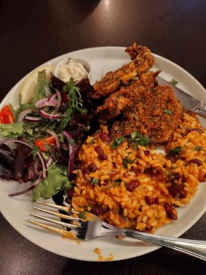 Peixe com arroz, tomate e feijão. Já comido um pouco porque estava mto bom! at Kong - Food Made With Compassion in Lisbon