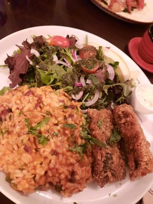 Fish with bean rice and salad at Kong - Food Made With Compassion in Lisbon