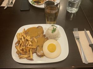 Bitoque (seitan steak with egg, fries and rice)  at Kong - Food Made With Compassion in Lisbon
