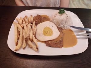 "Bitoque" - seitan steak, chips, rice, sauce and "fried egg" at Kong - Food Made With Compassion in Lisbon