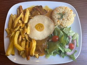 Bitoque with seitan steak and sunny side up egg (tofu and pumpkin).  at Kong - Food Made With Compassion in Lisbon