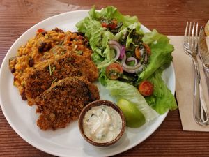 Fish with rice and beans at Kong - Food Made With Compassion in Lisbon