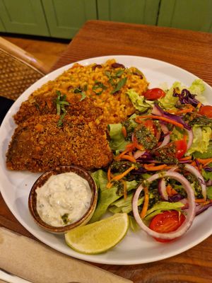 Fish with tomato and bean ricee  at Kong - Food Made With Compassion in Lisbon