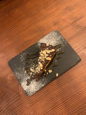 Snickera tart , omg so good! at Kong - Food Made With Compassion in Lisbon