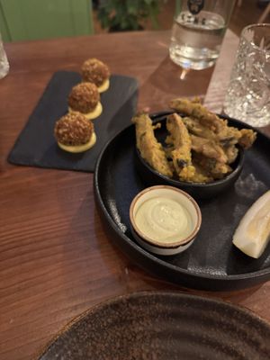 Croquettes and “cuttlefish”. Loved the cuttlefish the most out of the two. It was a delicious fried mushroom with a dip   at Kong - Food Made With Compassion in Lisbon