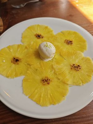 Pineapple Carpaccio with lime zest and coconut ice cream at Kong - Food Made With Compassion in Lisbon