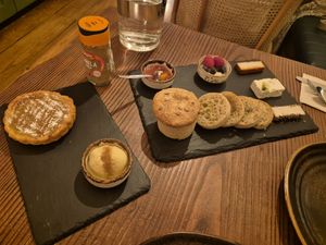 Pastel de nata com gelato (left) and cheese board (right). at Kong - Food Made With Compassion in Lisbon