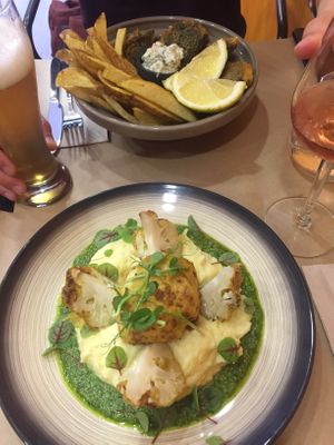 Dish of the day (tempura cauliflower with mash and pesto) and the fish and chips  at Kong - Food Made With Compassion in Lisbon