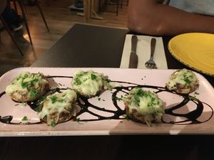 Entrance - mushroom with cheese and bacon  at Kong - Food Made With Compassion in Lisbon