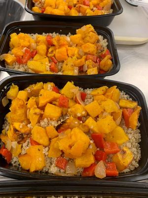 Savory roasted butternut squash over organic quinoa at Atlantis Vegan Grill in St Charles