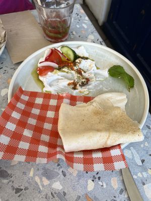 Half-eaten Labneh, it’s been a long time since I’ve had non vegan labneh, but it tasted so much better better than I remember dairy labneh tasting!   at Khamsa in Erskineville